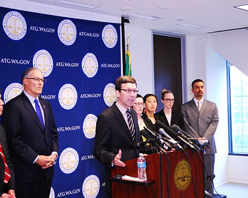 Photo of Washington Attorney General Bob Ferguson speaking at a press conference