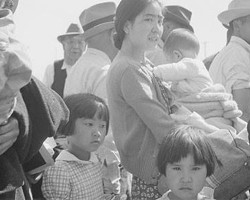Photo of Japanese-Americans headed to internment camps during WWII