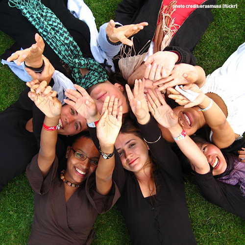 Photo of people with raised hands