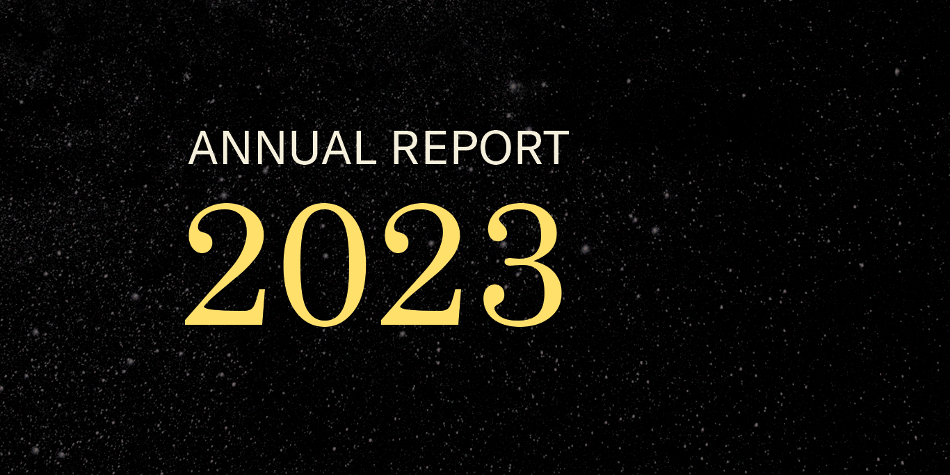 White and yellow text that says Annual Report 2023 on top of a black starry sky background