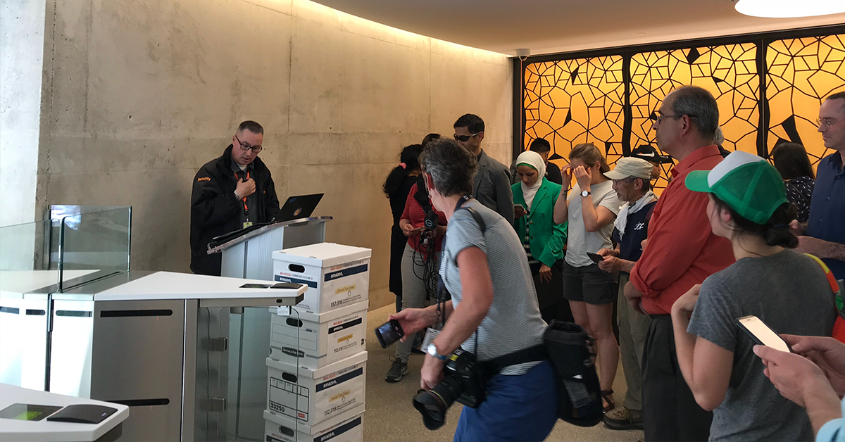 Photo of the petition boxes delivered to the spheres with coalition partners and the press watching