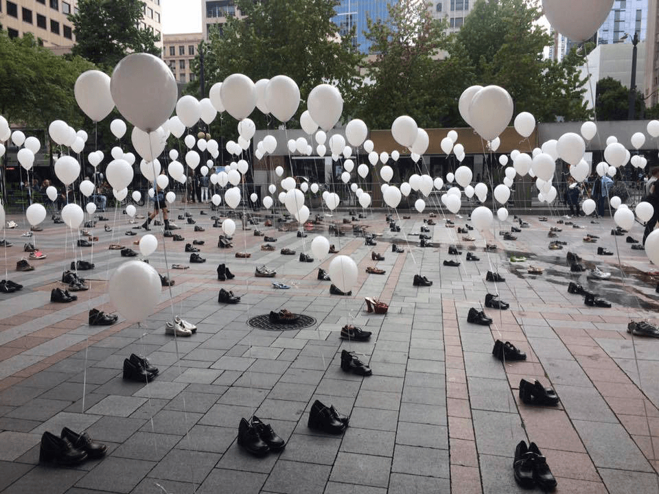 A photo of balloons representing lives lost to drug overdoses
