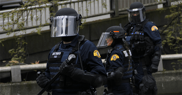 Photo of police in riot gear