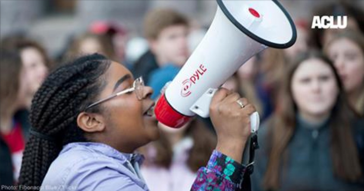 A student holding a megaphone