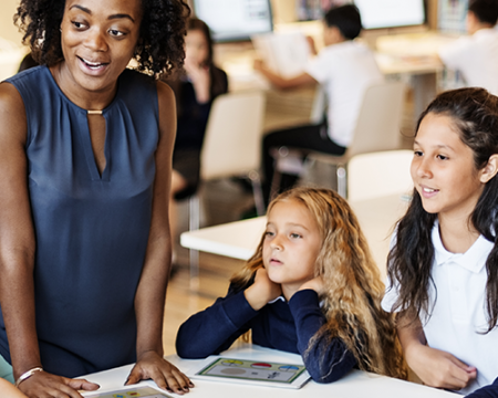 Photo of a teacher with students