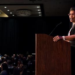 Photo of ACLU of Washington Deputy Director Michele Storms at the podium