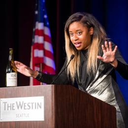 Photo of comedian Phoebe Johnson speaking at the 2016 ACLU of Washington Bill of Rights Dinner