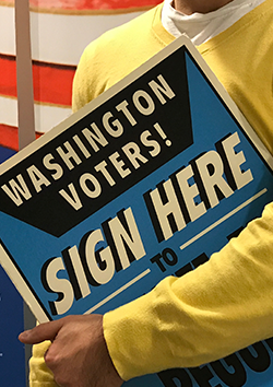 Photo of a signature gathering sign